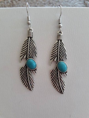 /products/boucles-plumes-turquoise/
